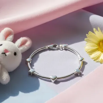 Srebrna Bransoletka dla Dziewczynki: Kompletny Przewodnik po Wyborze i Pielgnacji